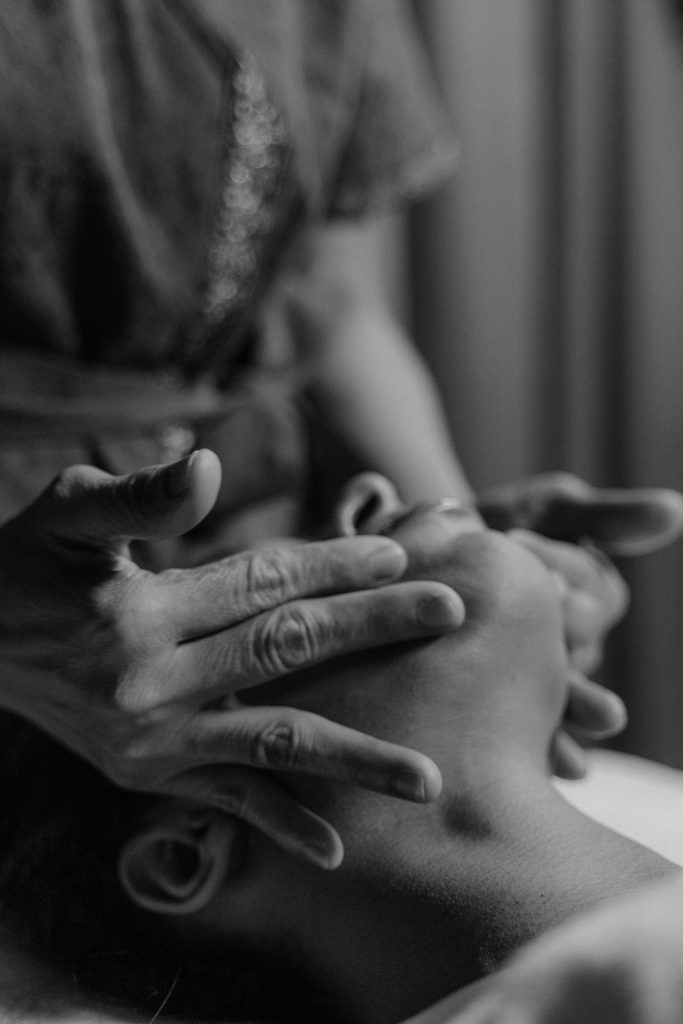 Indian Head Massage in Glasgow, Scotland. This image features a Therapist doing a Indian Head Massage. 